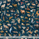 Patterned fabric with various animals on a blue background, featuring a ruler at the bottom.
