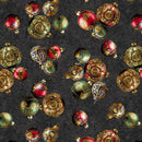 Christmas Ornaments tossed on a black background