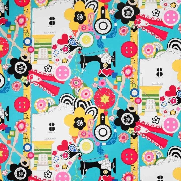 A swatch of "Sew Wow Sew Now" a brightly colored sewing themed pattern available for the Arrow Hydraulic Sewing chair