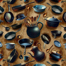 Fabric patterned with tossed kitchenwear including cast iron skillets, dutch ovens, and spoons on a beige background