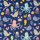 Pattern of cartoonish sea creatures on a dark blue background