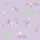 Flannel fabric swatch featuring gray elephants and clusters of multicolored flowers on a light purple background. 