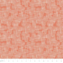 Patterned fabric with deer design on a coral background