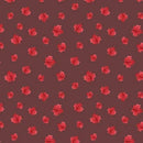 Pattern of red maple leaves on a brown background