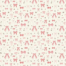 Fabric patterned with pink bows and small clusters of espresso beans on a cream background. 