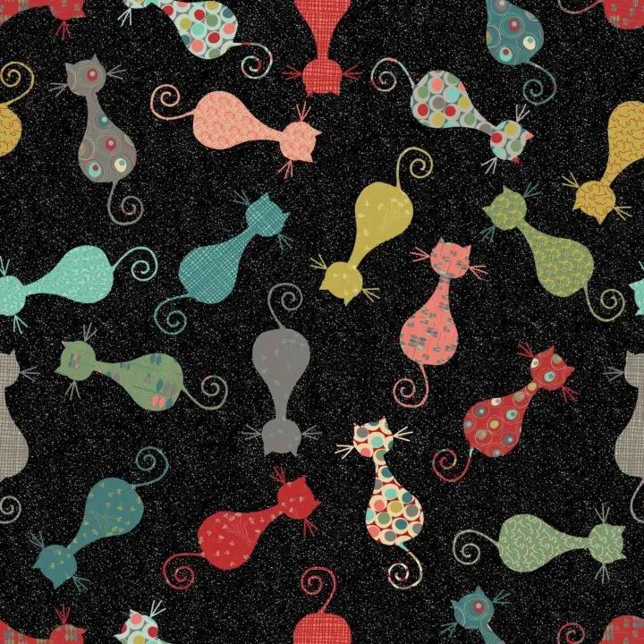 A Swatch of the pattern "Cat's Meow" for the Arrow Hydraulic Sewing Chair featuring tossed colorful cats on a black speckled background. 