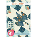 The front cover of the quilt pattern Cider Season designed by Angeles Jaso Tucker for It's Sew Emma. It features a sample quilt in the I Love Fall Most of All collection from Moda fabrics