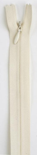 Cream colored invisible zipper on a white background