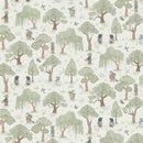 Patterned fabric with trees and people in a forest setting