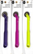 Three Dritz Tracing Wheel craft tools in different colors (purple, magenta, and neon yellow) on a white background.