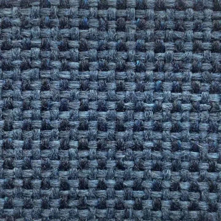 A swatch of the solid color "Duchess Blue" available for the Arrow hydraulic sewing chair