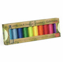 Box of Gütermann creative rPET-recycled polyester thread spools in various bright colors on a white background.