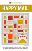 Front cover of the quilting pattern "happy mail" - a throw sized pattern featuring stamps and an envelope. 