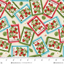 Fabric patterned with tossed strawberry seed packets on a cream background with a ruler for scale