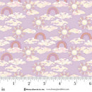Fabric with cloud, rainbow, and sun pattern on a purple background, with a ruler for scale.