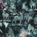 A batik fabric patterned with deer and pine trees on a loose, watercolor-esque background. 