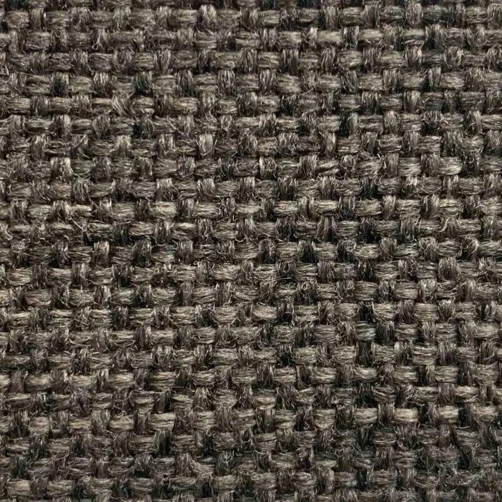 A close up of the solid fabric swatch "Lady Gray" available for the Arrow sewing chair. It is a medium warm gray. 