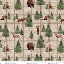 Fabric with a pattern of bears, moose, and deer on a wooden background
