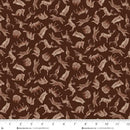Pattern of forest animals on a brown background with a ruler at the bottom.