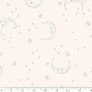 Fabric patterned with silver crescent moons and stars on a cream background