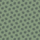 A repeating floral pattern featuring dark navy botanical motifs on a muted sage green background.