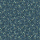 A close-up of a repeating floral pattern on a muted blue-gray background, featuring small white and pale green blossoms with dark stems and leaves.