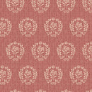 Patterned fabric with leaf design on a red background