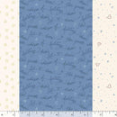 Marcus Fabrics Snowman's Village Strip-It Blue R191413D BLUE with ruler for scale, showing several of the patterns included in the stripe