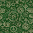 A close-up of a green fabric or wallpaper pattern featuring repeating vintage-style medallions, floral motifs, and ornamental medallions in a muted beige or tan color.