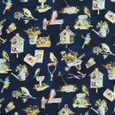 Patterned fabric with birds, birdhouses, and gardening elements on a dark blue background