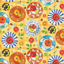Colorful pattern of plates, tomatoes, and olives on a yellow background