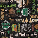 Patterned fabric with camping-themed designs including text and illustrations on a black background.