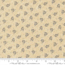 Floral patterned fabric with a ruler for scale on a beige background