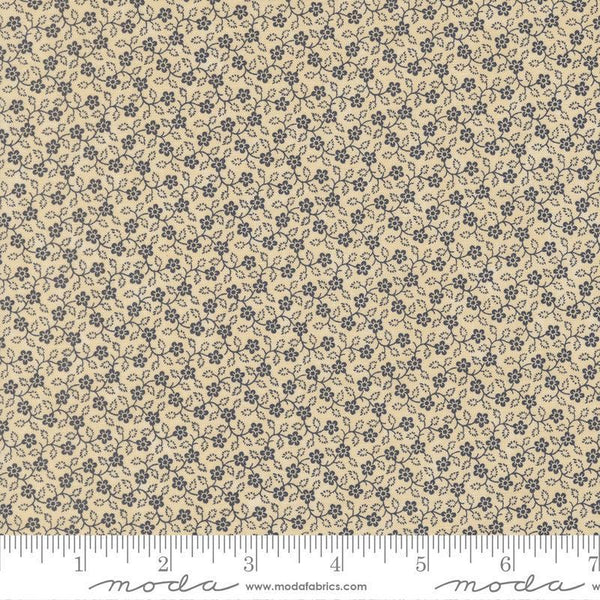 Floral patterned fabric with a ruler at the bottom for scale