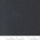 Navy fabric with small white dot pattern, featuring Moda label at the bottom.