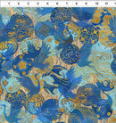 Fabric patterned with tossed cranes and Asian inspired emblems in blue and gold on a light blue background. There is a ruler along the top edge for scale. 