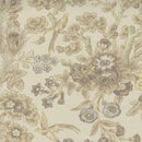 A traditional fabric featuring birds, branches, and bundles of flowers in tan. 
