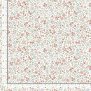 Floral patterned fabric with a ruler for scale on a white background