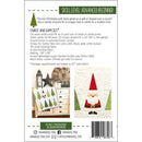 The back cover of the Santa in the Trees pattern, including fabric and supply requirements and images of the sample quilt
