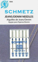 A multi pack of 5 Schmetz denim needles including sizes 90/14, 100/16, and 110/18.