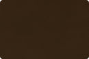 A dark brown fabric swatch with a soft, plush texture. 