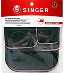 Singer 16 piece iron on fabric repair kit. It also includes a stencil with circle, pentagon, triangle, and star shapes to make decorative patches.