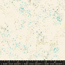 A pattern of speckles in metallic gold, gray, and aqua on a cream background. There is a ruby star society ruler at the bottom to show the scale of the pattern. 