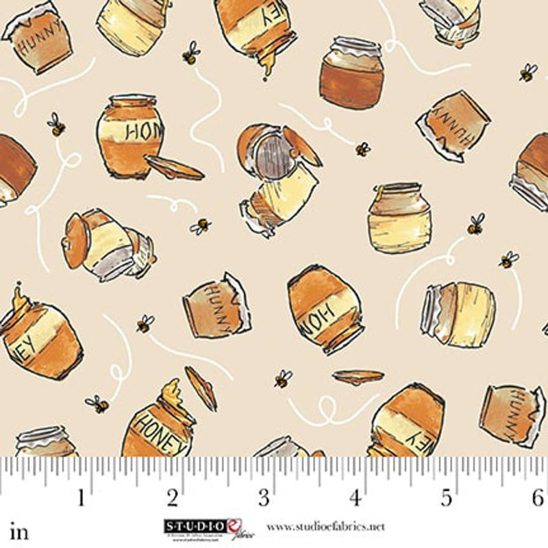 Pattern of honey jars and bees on a beige background with a ruler for scale.