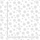 Pattern of snowflakes on a white background with a ruler for scale.