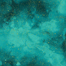 A fabric swatch patterned with a painterly teal night sky speckled with gold metallic stars. 