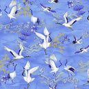 Pattern of white cranes and flowers on a blue background