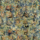 Patterned fabric with floral design in green, orange, and brown tones.