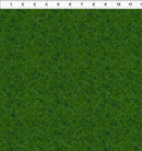 Green fabric with a subtle pattern on a green background with measurement scale